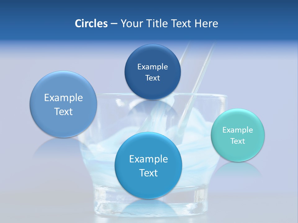 A Glass Of Blue Liquid With A Spoon In It PowerPoint Template