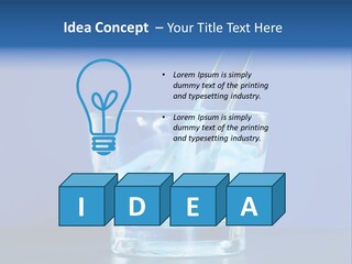 A Glass Of Blue Liquid With A Spoon In It PowerPoint Template