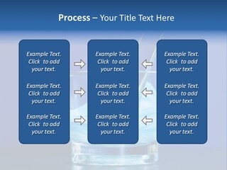 A Glass Of Blue Liquid With A Spoon In It PowerPoint Template