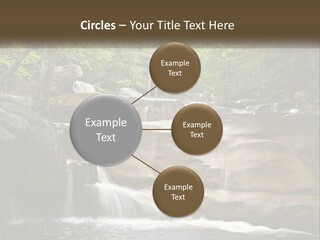 A Waterfall In The Middle Of A Forest PowerPoint Template
