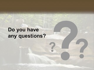 A Waterfall In The Middle Of A Forest PowerPoint Template