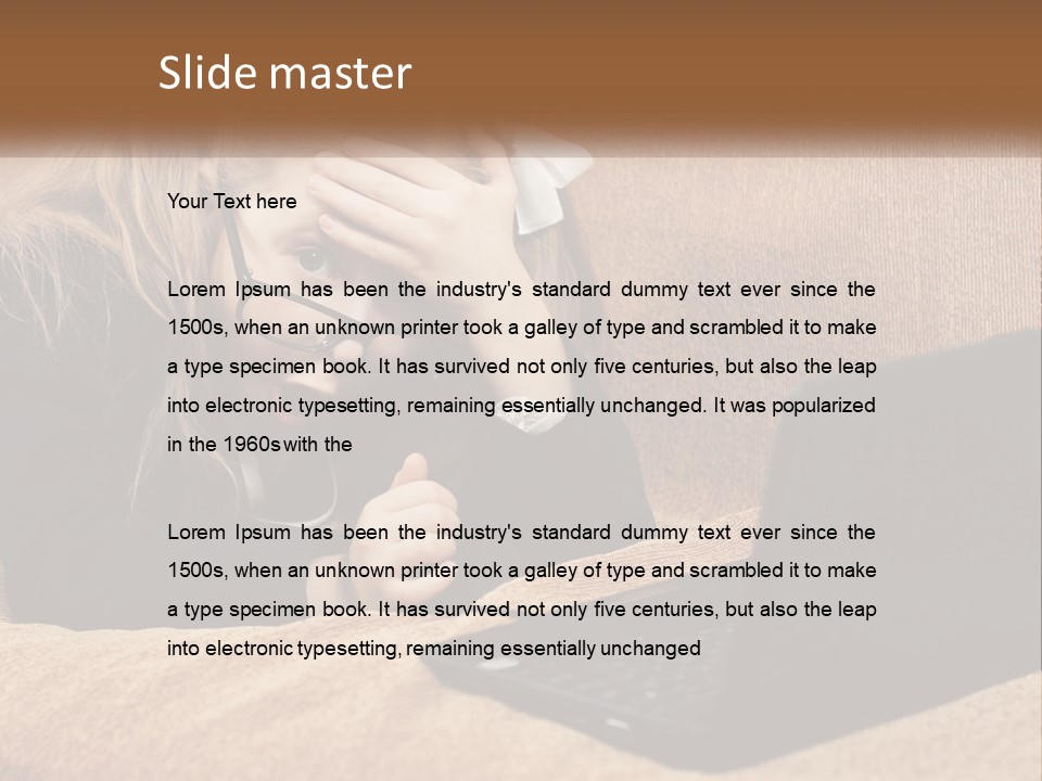 A Little Girl Sitting On A Couch Looking At A Laptop PowerPoint Template