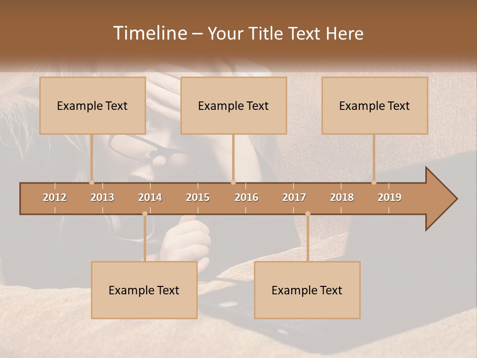 A Little Girl Sitting On A Couch Looking At A Laptop PowerPoint Template