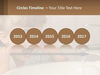 A Child Brushing His Teeth In Front Of A Sink PowerPoint Template