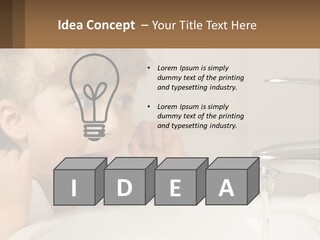 A Child Brushing His Teeth In Front Of A Sink PowerPoint Template
