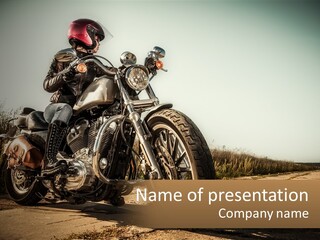 A Man Riding A Motorcycle Down A Dirt Road PowerPoint Template