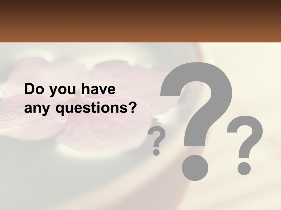 A Pink Flower Floating In A Bowl Of Water PowerPoint Template