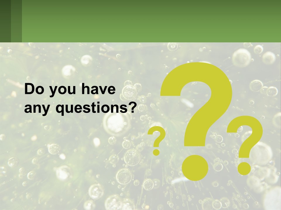 A Green Plant With Water Droplets On It PowerPoint Template