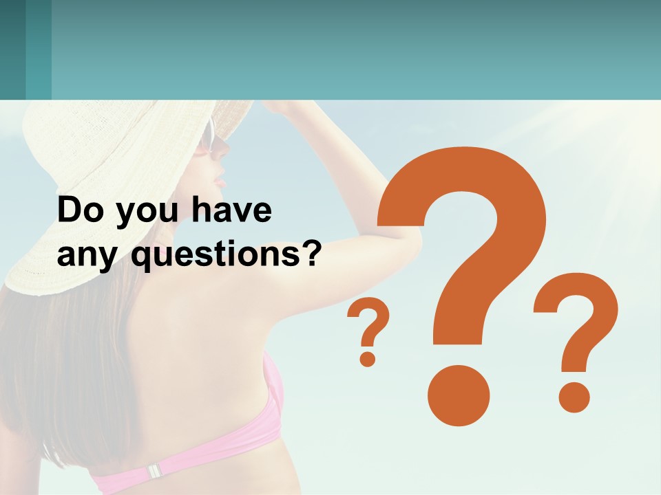 A Woman In A Hat Is Standing On The Beach PowerPoint Template