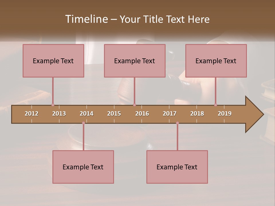 A Person Holding A Wooden Gaven On Top Of A Table PowerPoint Template