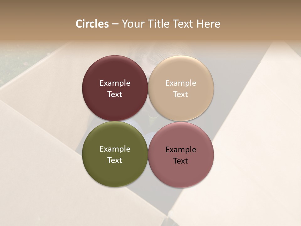 A Little Girl Sitting Inside Of A Cardboard Box PowerPoint Template