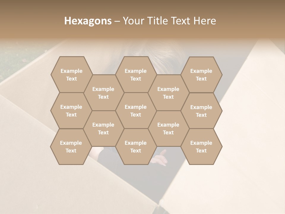 A Little Girl Sitting Inside Of A Cardboard Box PowerPoint Template