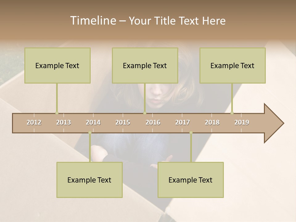 A Little Girl Sitting Inside Of A Cardboard Box PowerPoint Template