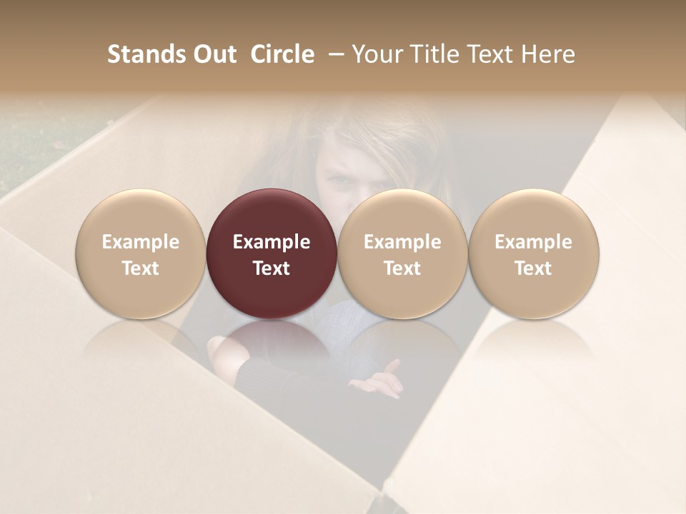 A Little Girl Sitting Inside Of A Cardboard Box PowerPoint Template