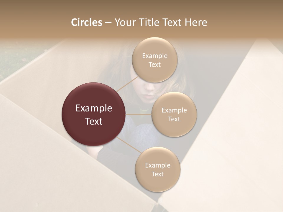 A Little Girl Sitting Inside Of A Cardboard Box PowerPoint Template