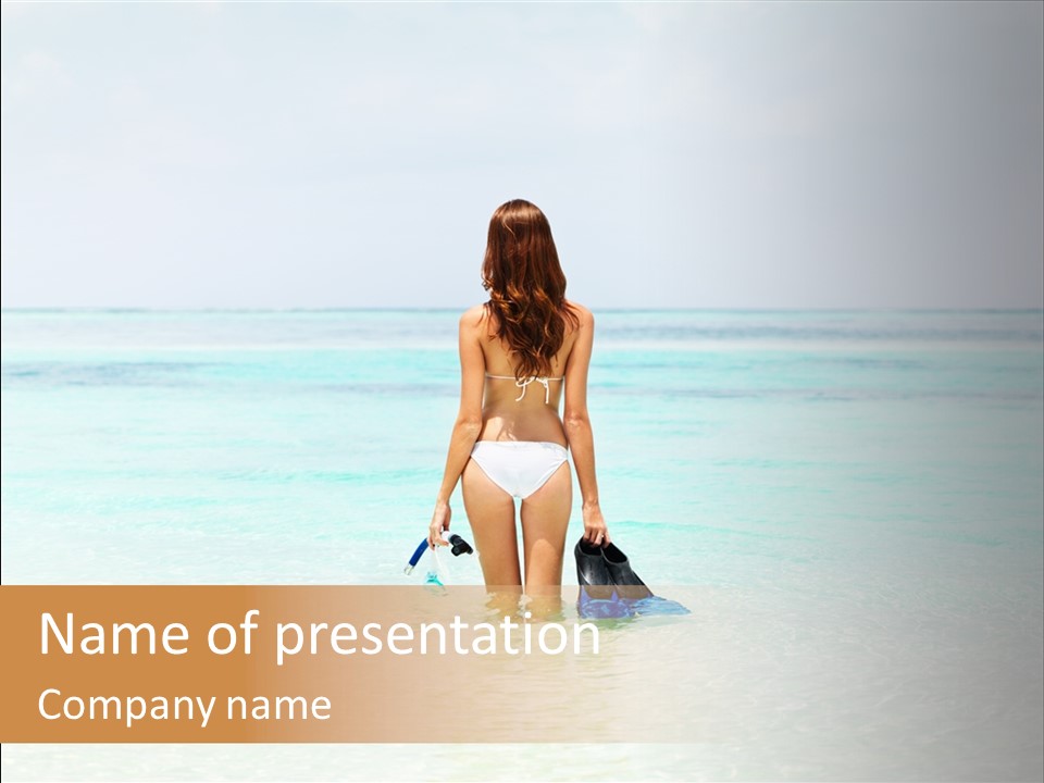 A Woman In A Bikini Is Standing In The Water PowerPoint Template
