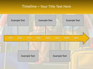 A Little Girl Sitting In The Back Of A Car With A Dog PowerPoint Template