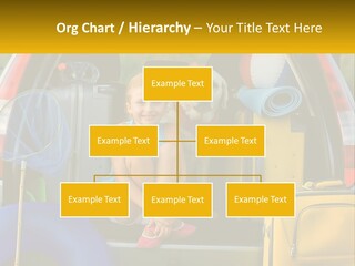 A Little Girl Sitting In The Back Of A Car With A Dog PowerPoint Template