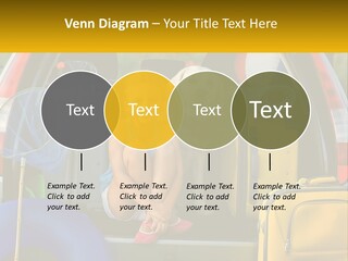 A Little Girl Sitting In The Back Of A Car With A Dog PowerPoint Template