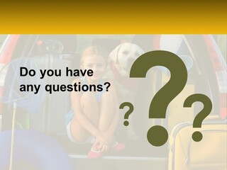 A Little Girl Sitting In The Back Of A Car With A Dog PowerPoint Template