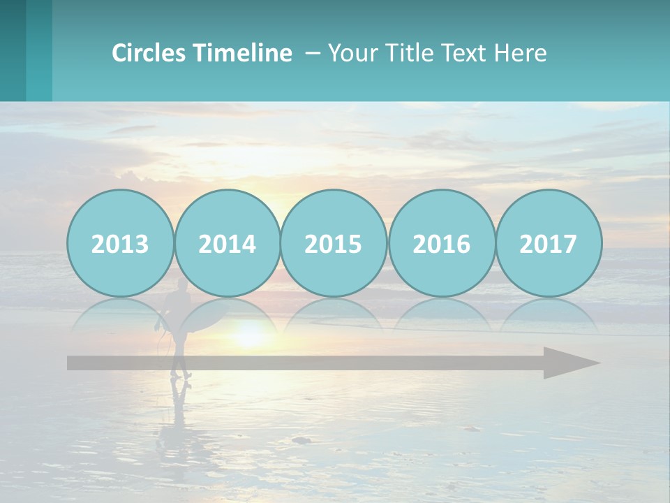 A Person Holding A Surfboard On A Beach At Sunset PowerPoint Template