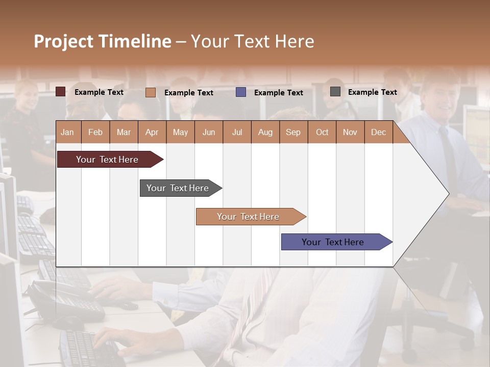 A Group Of People Sitting In Front Of Computers PowerPoint Template