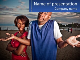 A Man And A Woman Standing On A Beach PowerPoint Template