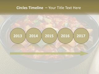 A Bowl Of Soup With Bread On The Side PowerPoint Template