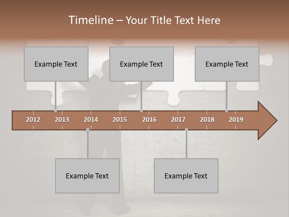 A Man In A Suit Holding A Puzzle Piece PowerPoint Template