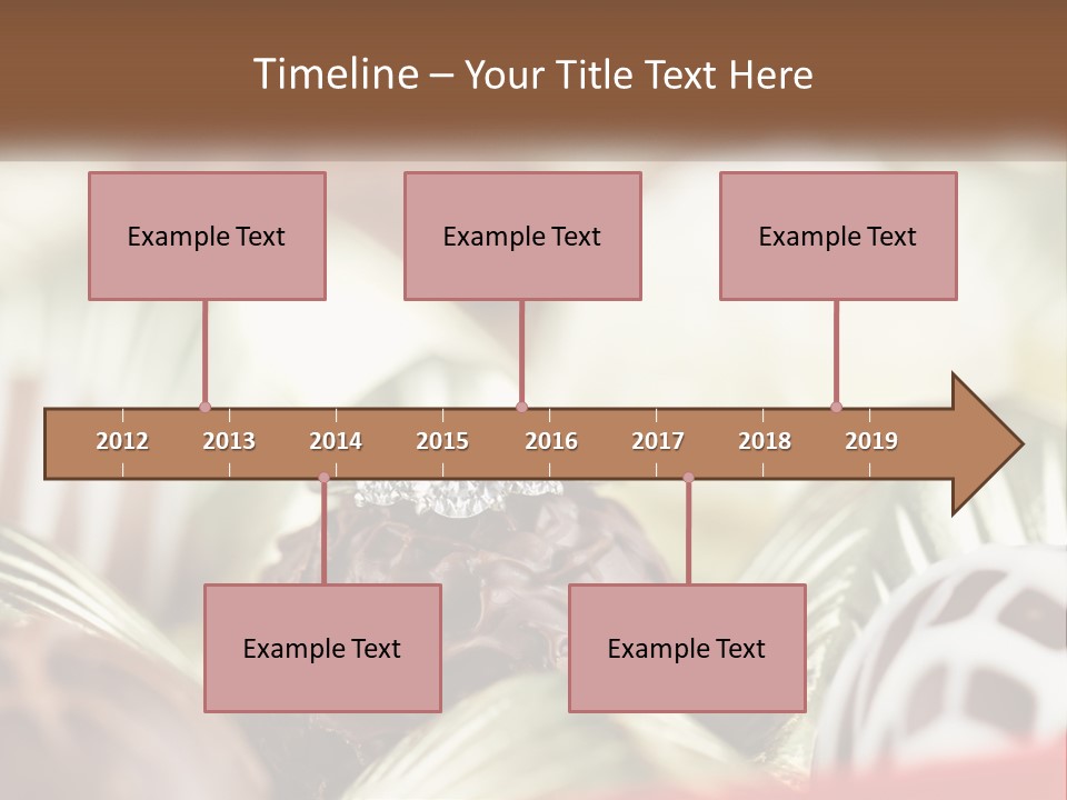 A Group Of Chocolates With A Diamond Ring On Top PowerPoint Template