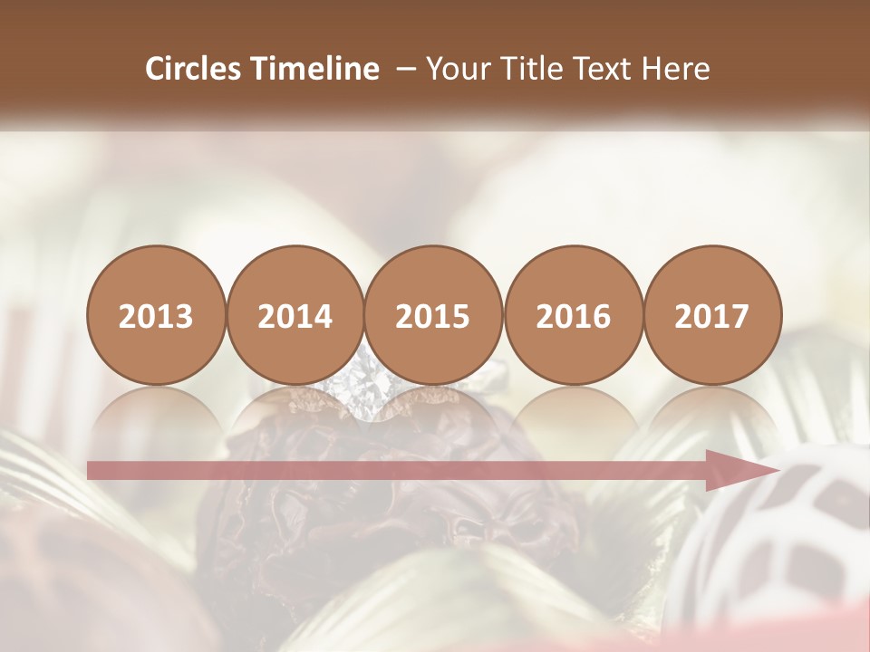 A Group Of Chocolates With A Diamond Ring On Top PowerPoint Template