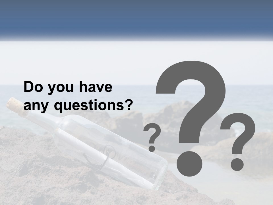A Message In A Bottle On A Rocky Beach PowerPoint Template