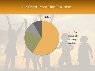 A Group Of Children Are Silhouetted Against A Sunset PowerPoint Template