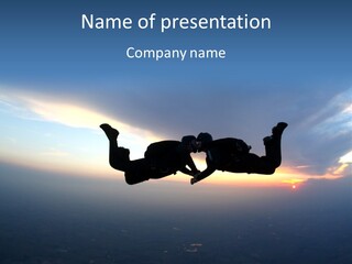 Two People Jumping Into The Air With A Sky Background PowerPoint Template