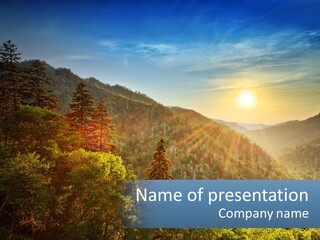A Scenic View Of A Mountain Range With The Sun Setting In The Distance PowerPoint Template