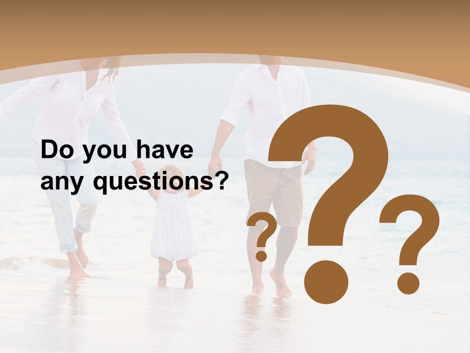 A Family Walking On The Beach Holding Hands PowerPoint Template