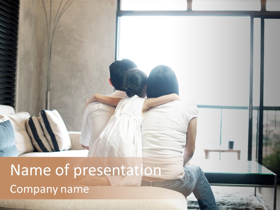 A Group Of People Sitting On A Couch In A Living Room PowerPoint Template