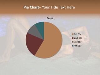 A Woman In A Bikini Laying On A Surfboard In A Pool PowerPoint Template