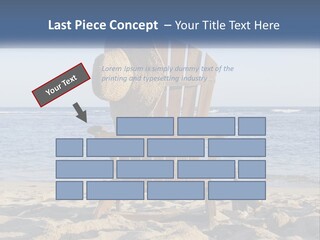 A Wooden Chair Sitting On Top Of A Sandy Beach PowerPoint Template