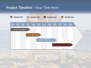 A Wooden Chair Sitting On Top Of A Sandy Beach PowerPoint Template
