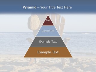 A Wooden Chair Sitting On Top Of A Sandy Beach PowerPoint Template