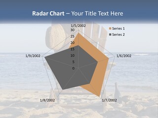 A Wooden Chair Sitting On Top Of A Sandy Beach PowerPoint Template
