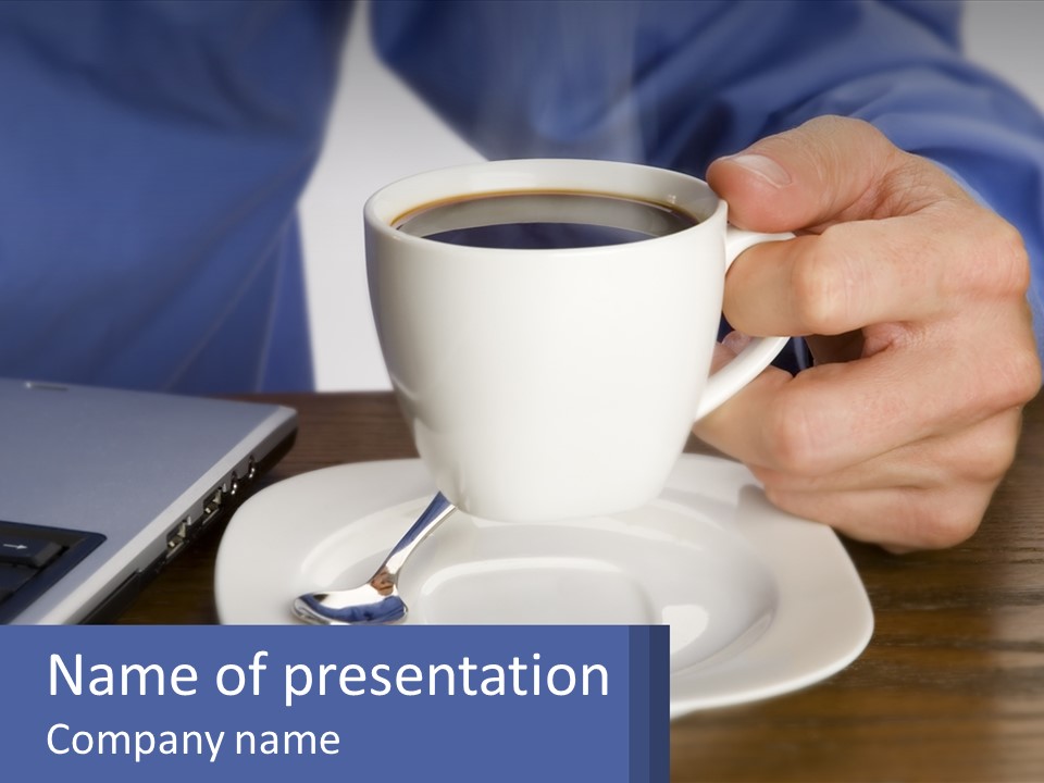 A Person Holding A Cup Of Coffee In Front Of A Laptop PowerPoint Template