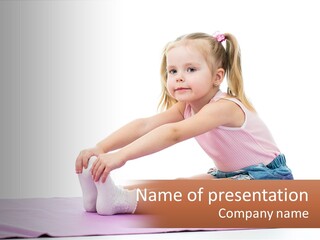 A Little Girl Sitting On A Mat With Her Feet On The Ground PowerPoint Template