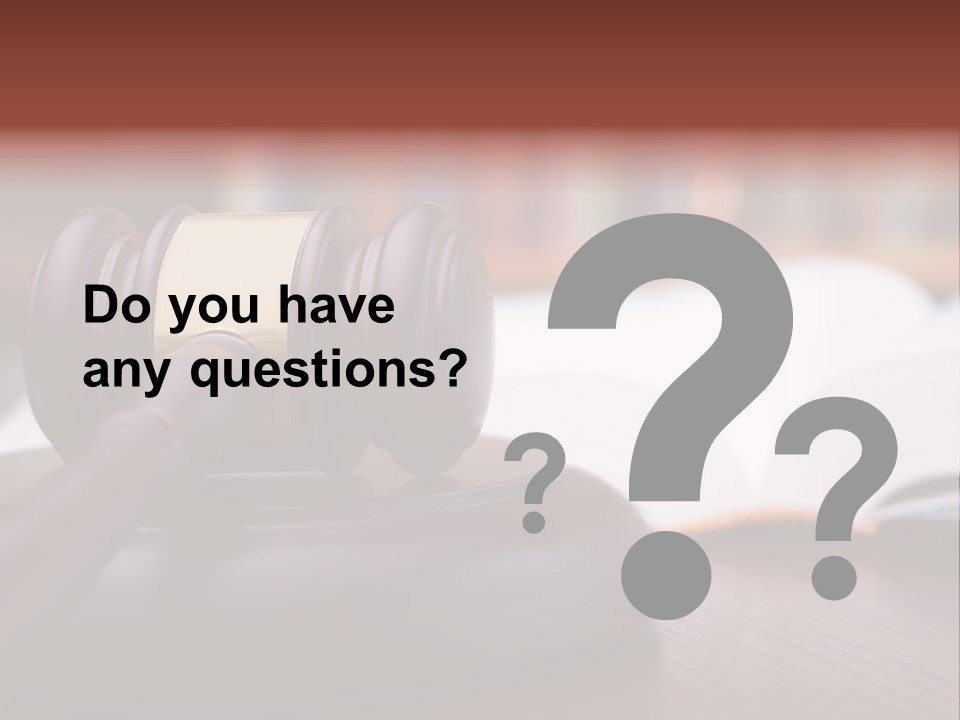 A Wooden Judge's Hammer On Top Of A Wooden Table PowerPoint Template