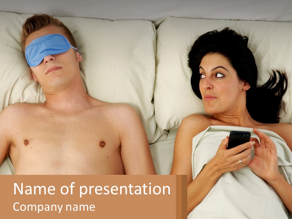 A Man And A Woman Laying In Bed With A Blindfold On Their Eyes PowerPoint Template