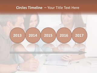 A Group Of Doctors Looking At A Computer Screen PowerPoint Template