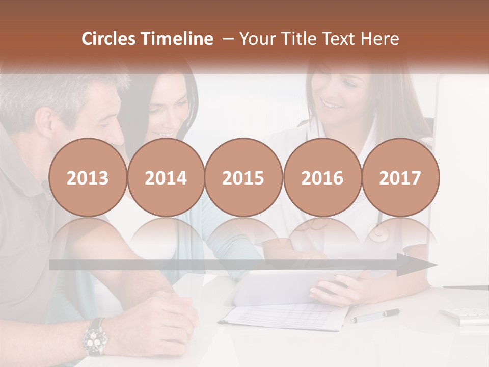 A Group Of Doctors Looking At A Computer Screen PowerPoint Template