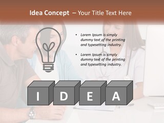 A Group Of Doctors Looking At A Computer Screen PowerPoint Template