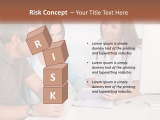 A Group Of Doctors Looking At A Computer Screen PowerPoint Template